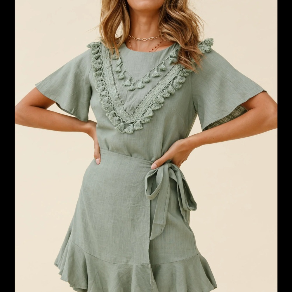 Large Indikah green flutter sleeve wrap dress with tassels!